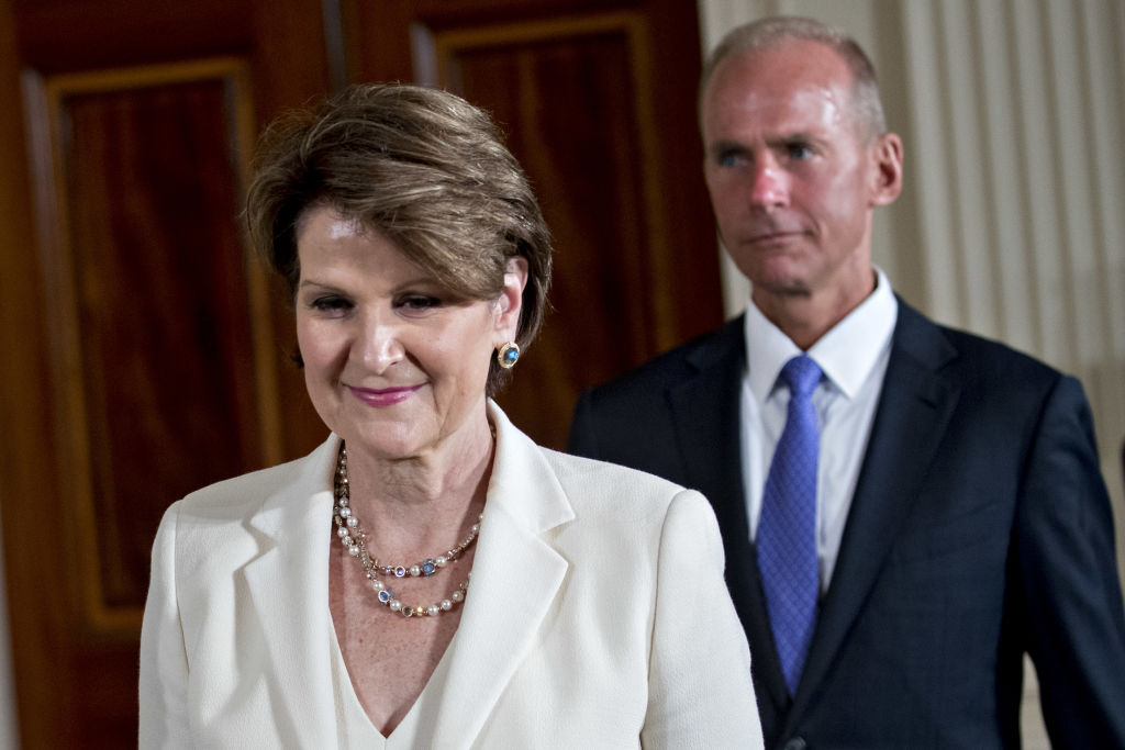 Marillyn Hewson, president and chief executive officer of Lockheed Martin Corp., left, and Dennis Muilenburg, chairman and chief executive officer of Boeing Co., attend a National Space Council meeting on Monday. 