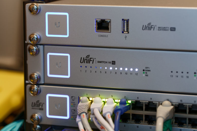 Picture of three Unifi devices.