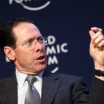 AT&T CEO Randall Stephenson speaking and gesturing in an appearance at the World Economic Forum.