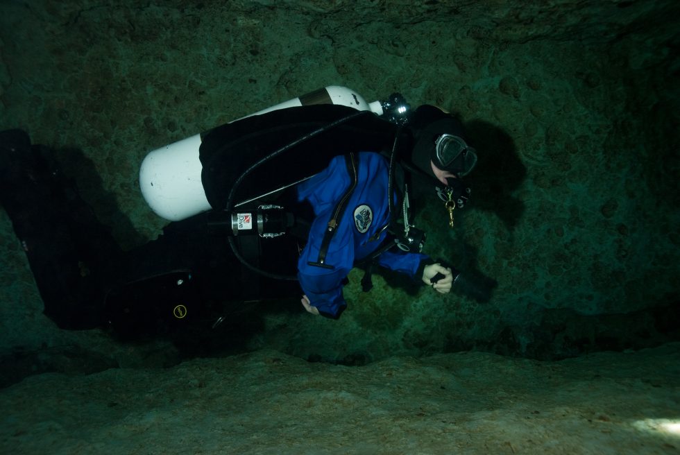 The author during a much later (post-certification!) cave dive, with properly rigged cave diving gear.