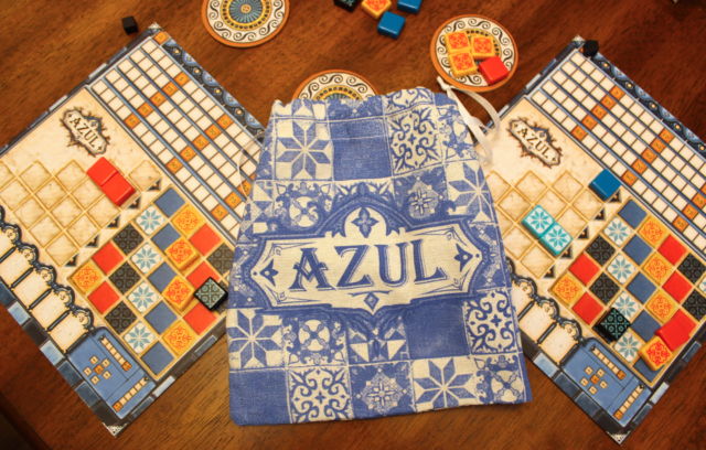 <em>Azul</em> even comes with its own custom-printed bag.