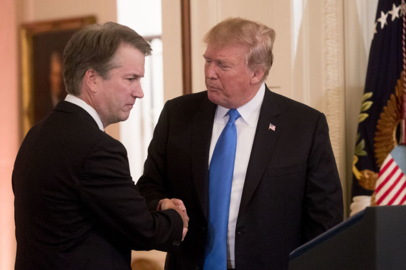 President Donald Trump shaking hands with Brett Kavanaugh, his nominee for the Supreme Court.