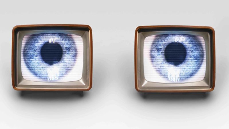 Two TV sets, with each showing a picture of an eye.