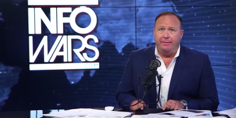 photo of Alex Jones hit with bans from Facebook and Apple image