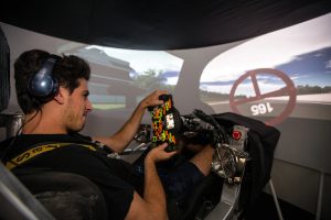 Tristan Nunez in the Multimatic DIL simulator