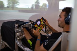 Harry Tincknell in the Multimatic DIL simulator