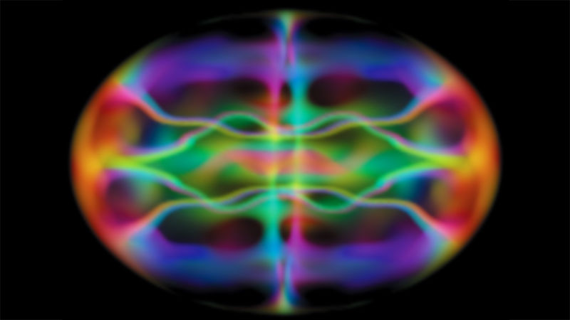 Image of multi-colored waves of atoms.