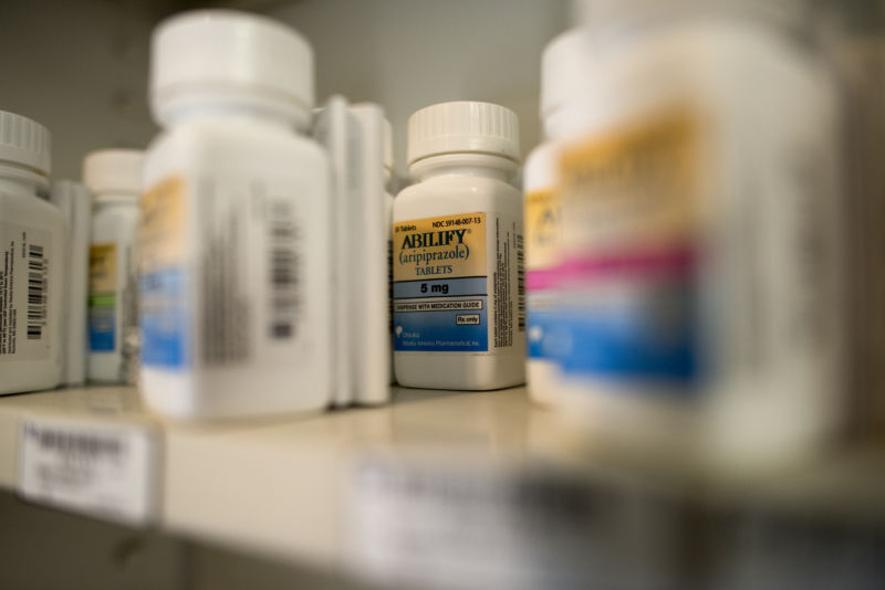 Bottles of Bristol-Myers Squibb Co. Abilify brand medication sits on a pharmacy shelf in Princeton, Illinois, on Wednesday, October 22, 2014. 