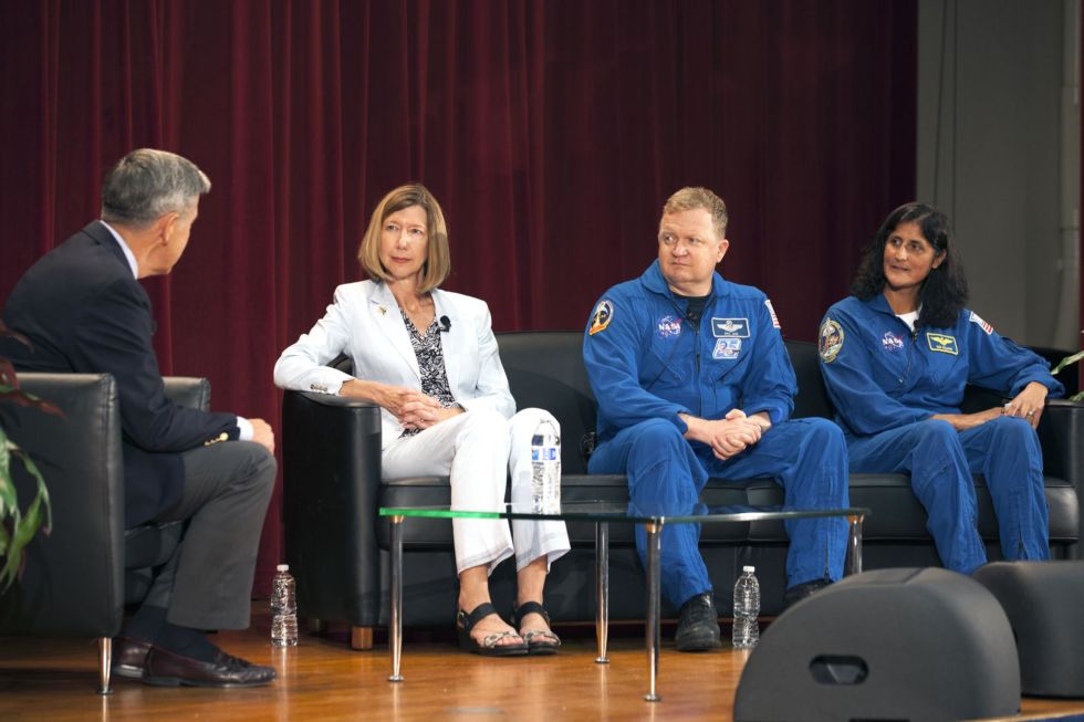 Kathy Lueders, center, has managed NASA’s commercial crew program since 2014.