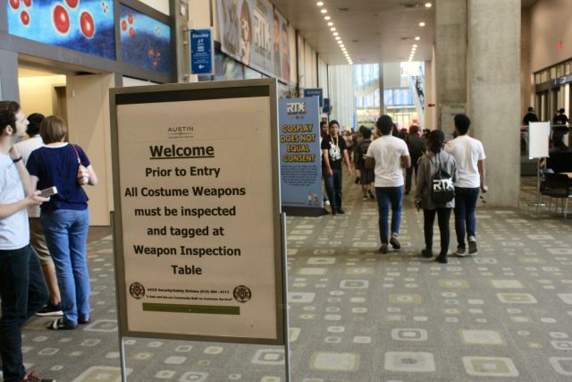 Sign: Prior to entry, all costume weapons must be inspected and tagged at Weapons Inspection Table