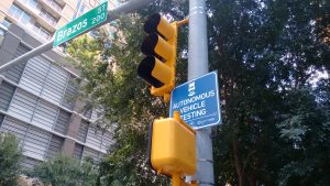 Signs about Austin's autonomous metro bus
