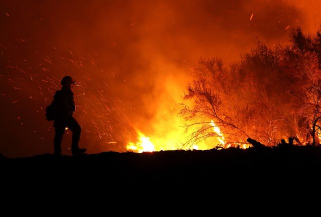 A firefighter battling the Mendocino Complex fire on August 7, 2018, near Lodoga, California.