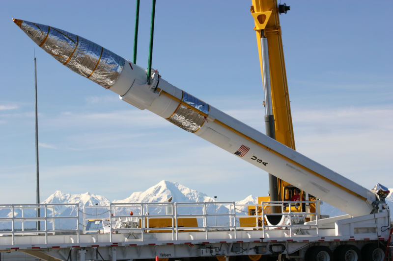 Image of a missile being lifted into place.