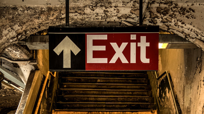 Exit sign in a subway.