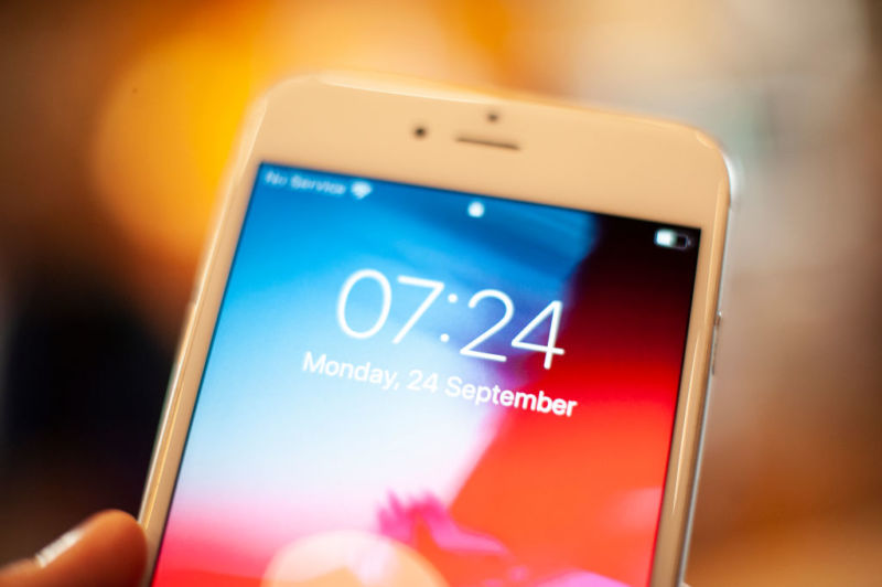 An Apple iPhone lock screen appears in this photo illustration of September 24, 2018.