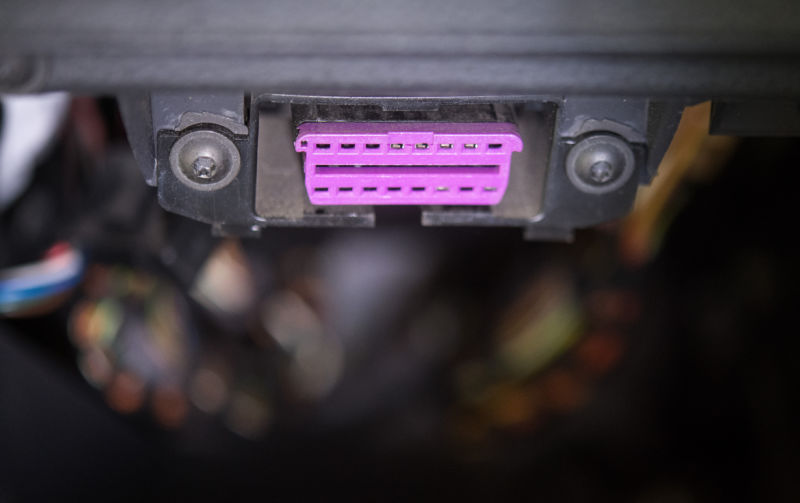 Photo of a purple electronics port.