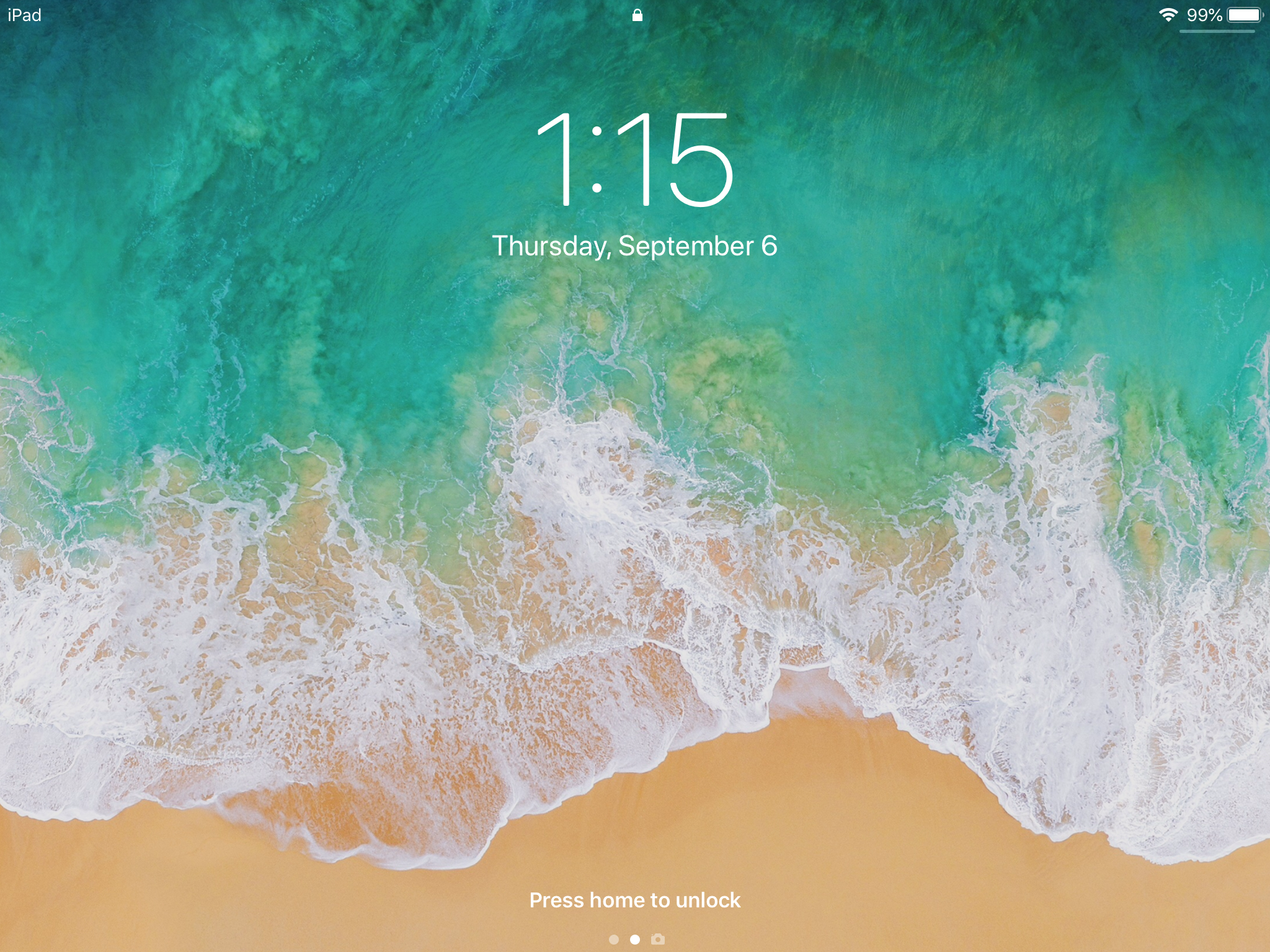 The lock screen in iOS 12 on an iPad.