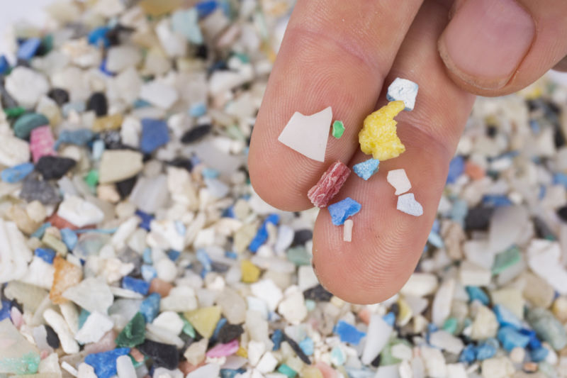 Microplastics come from tiny plastic pieces in products like microbeads, as well as broken-down pieces of larger plastics.
