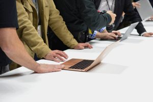 The 2018 MacBook Air sitting on a white table.