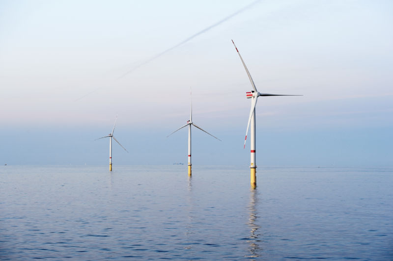 Several offshore wind turbines.