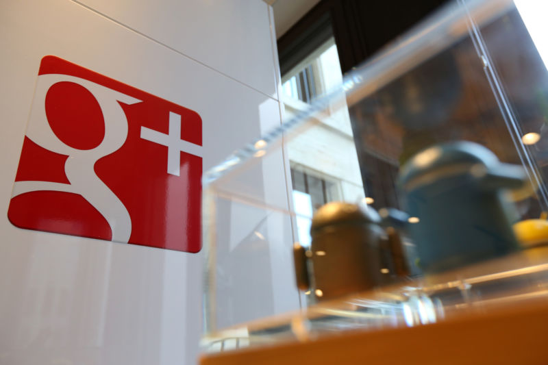 The Google Plus (G+, or Google +) social network logo is seen in the company's offices behind Android toys on August 21, 2014 in Berlin, Germany. 