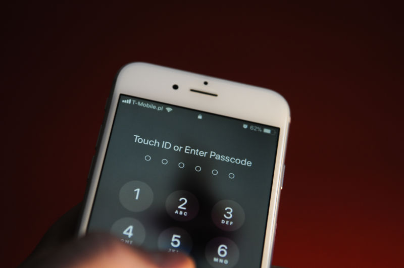 Close-up photo of smartphone password screen.