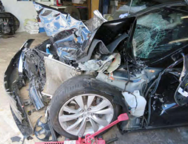 The front of Tesla's owner's car, Shawn Hudson, was totally destroyed. Hudson survived the crash.