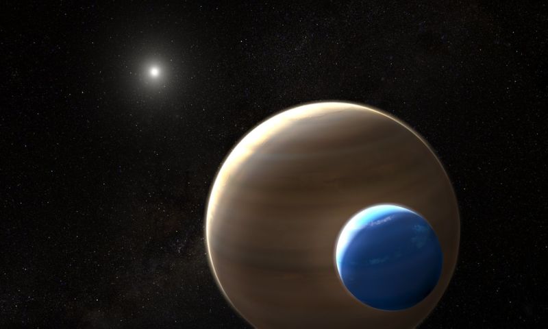 Image of a two massive bodies orbiting a star.