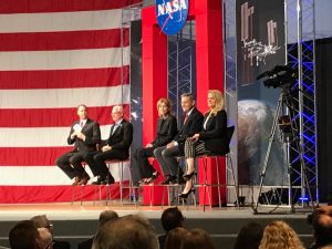 Caret, center, and Shotwell, far right, at Johnson Space Center in August.