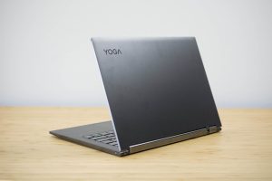 Lenovo's Yoga C930 2-in-1 on a wooden table.