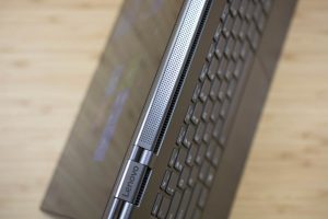 Lenovo's Yoga C930 2-in-1 on a wooden table.