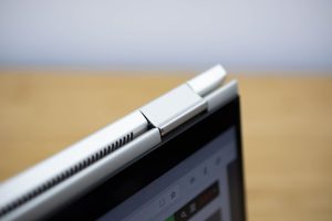 The 2018 HP Elitebook x360 2-in-1 sitting on a wooden table.
