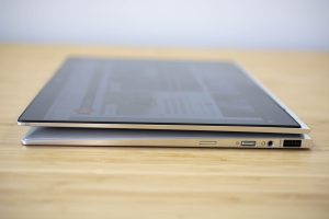 The 2018 HP Elitebook x360 2-in-1 sitting on a wooden table.