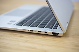 The 2018 HP Elitebook x360 2-in-1 sitting on a wooden table.
