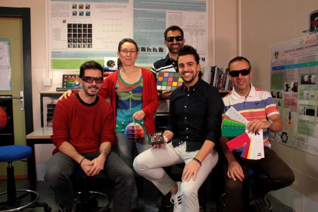 The University of Granada research team posing with EnChroma glasses.