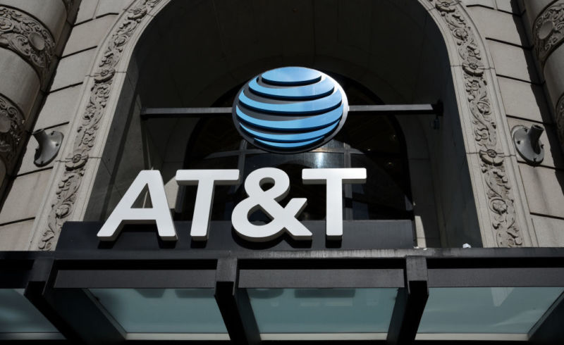 An AT&T logo above the entrance to an AT&T store.