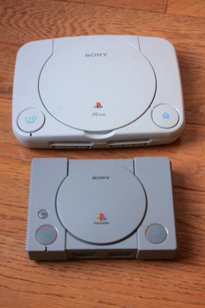 Two gaming consoles side-by-side.