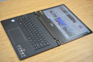 The 2018 Acer Swift 7 sitting on a wooden table.