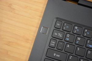 The 2018 Acer Swift 7 sitting on a wooden table.