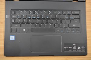 The 2018 Acer Swift 7 sitting on a wooden table.