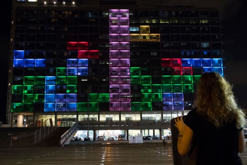 A giant Tetris board illuminating the windows of the Tel Aviv-Yafo Municipality in 2016. Playing Tetris provides a useful distraction during anxious waiting periods.