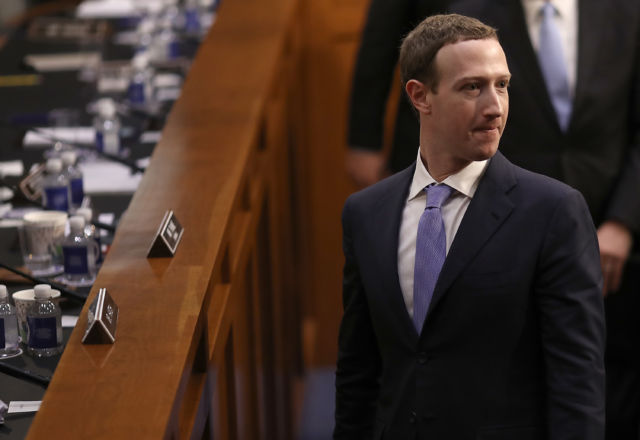 Facebook CEO Mark Zuckerberg departs after testifying on Capitol Hill, April 10, 2018. 