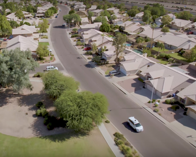 This is a screenshot from Waymo's <a href="https://www.youtube.com/watch?v=aaOB-ErYq6Y">November 2017 video</a> announcing the start of fully driverless testing. It shows fully driverless Waymo cars driving on residential streets that are almost empty.