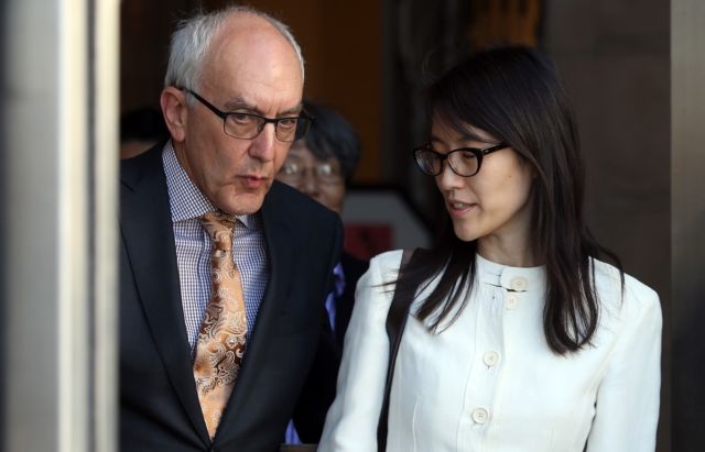 Former Reddit CEO Ellen Pao leaving the San Francisco Superior Court Civic Center Courthouse with her attorney on March 27, 2015, after losing her sexual harassment lawsuit against venture capital firm Kleiner Perkins Caulfield and Byers. 