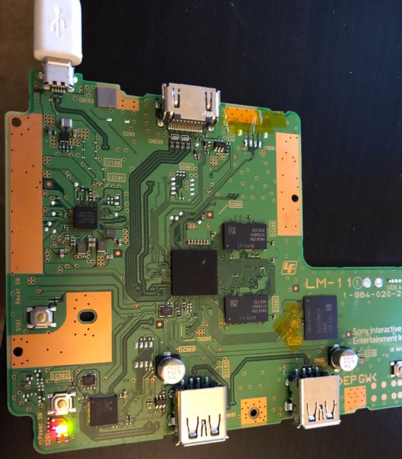 The PlayStation Classic's internal USB, removed and picked at as part of the hacking effort.