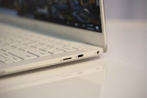 The new Dell XPS 13 laptop sitting on a white table.