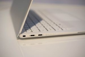 The new Dell XPS 13 laptop sitting on a white table.