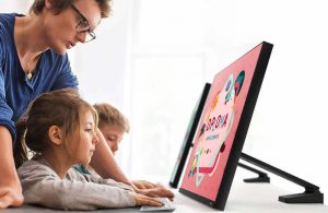 Kids using the the Samsung Space Monitor