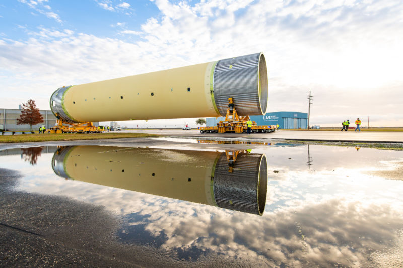 Technicians at NASA's Michoud Assembly Facility in New Orleans moved the Space Launch System's liquid hydrogen tank from the factory to the dock, where it was loaded onto the Pegasus barge on Dec. 14, 2018. 