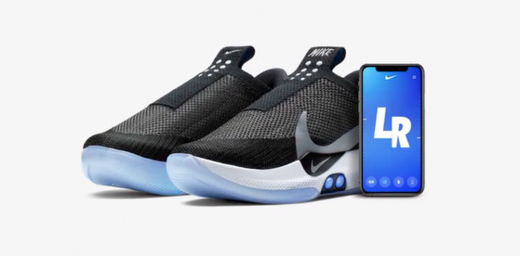 A pair of Nike Adapt BBs next to an iPhone, which was clearly the primary development platform. 